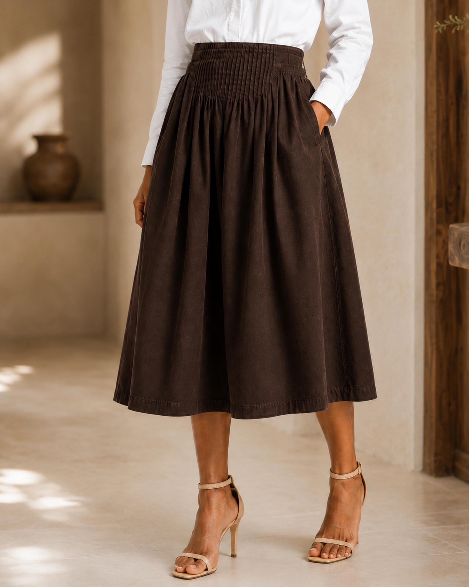 Pintuck yoke detail on the Amara midi skirt